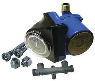 Watts hot water recirculating pump and programmable timer pictured in the original article