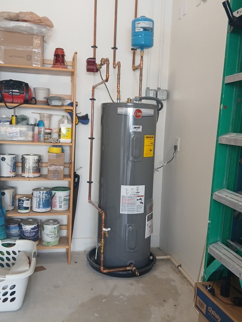 Rheem electric hot water heater installed by WHE during a warranty replacement
